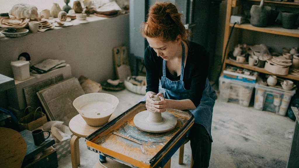 Small business pottery studio manages debt utilization